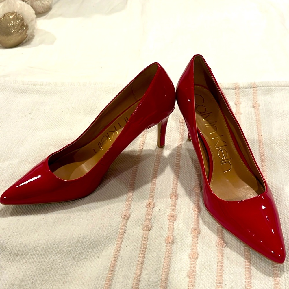 Red low heeled pumps